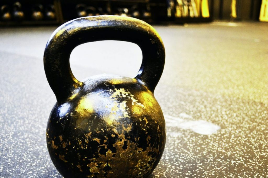 black kettle bell on floor